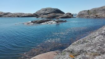 Landscape of rocks in a blue river