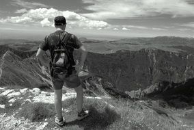 hiker in the mountains in black and white image