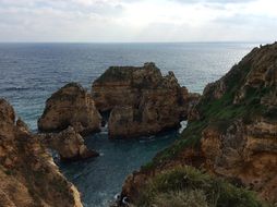 Beautiful and colorful rocks on the coast with water