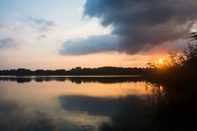 sunset over the lake in masuria in poland