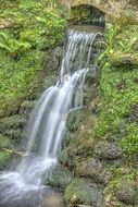 Landscape of rocky waterfall