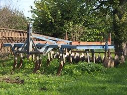 Harrow near the fence