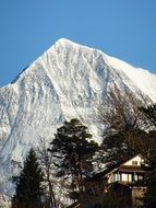 distant view of a mountain range in the snow in austria