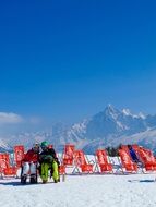 climbers rest on top of the Alps