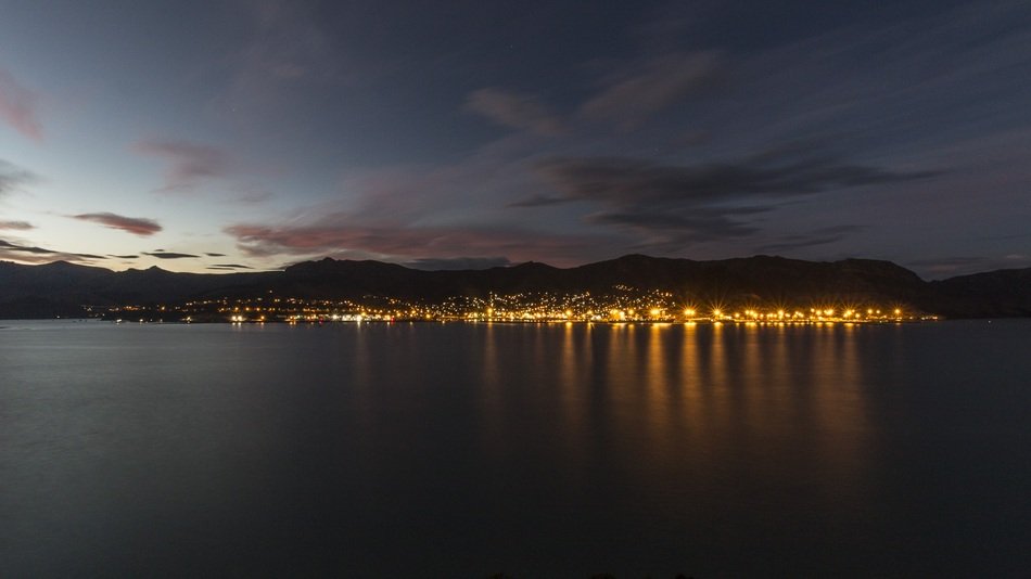 distant view of the night city of lyttelton on the Pacific coast