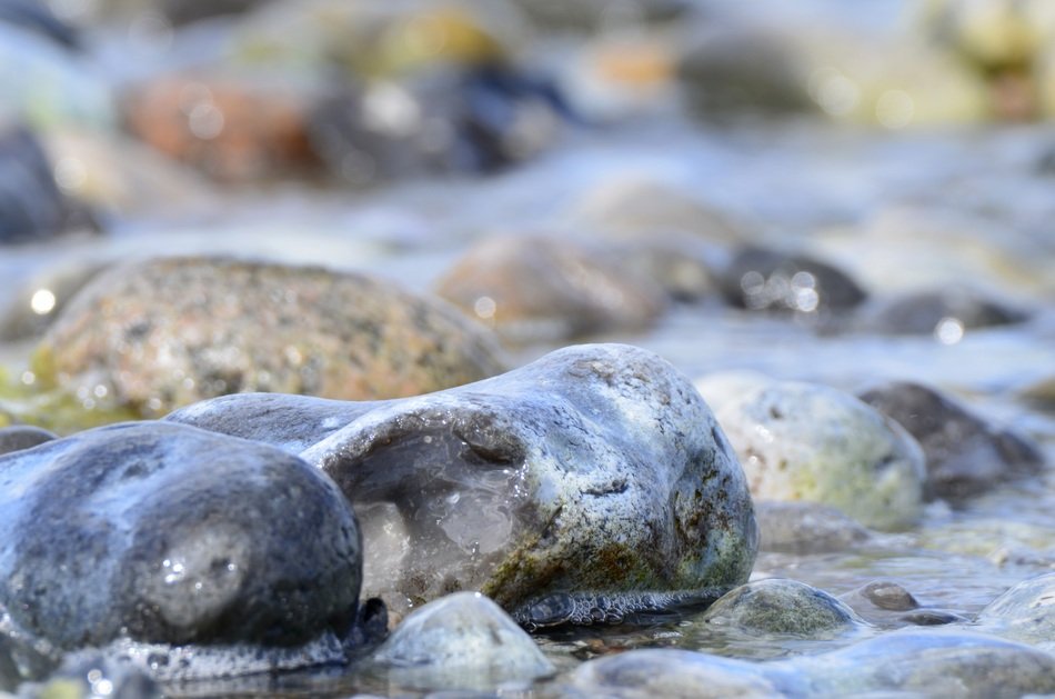 stones in sea foam