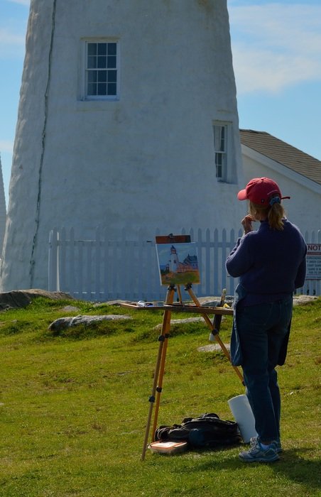 artist near the lighthouse in maine