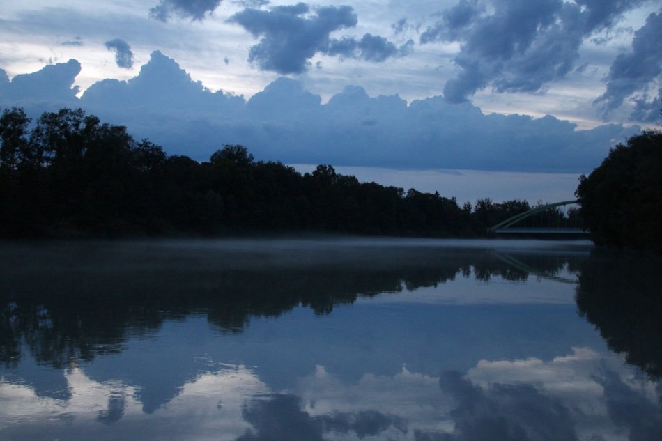 scenic nature reflected in a river in bavaria