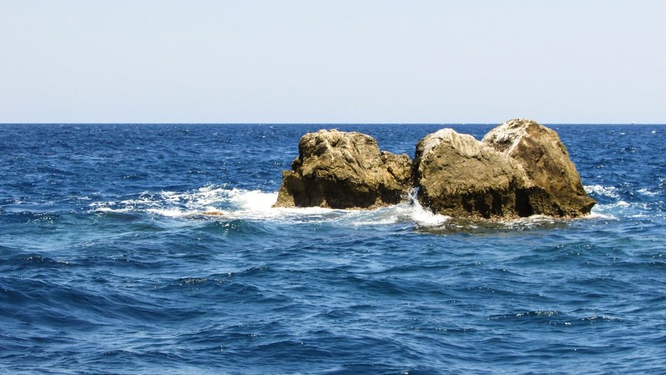 rocks in the sea in greece