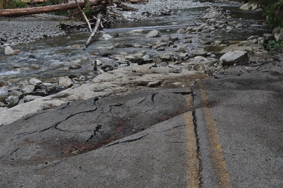 tracks ends in mug on River bank