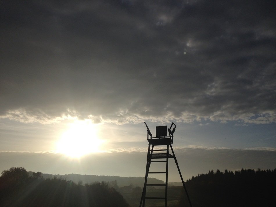 tower on the field at sunrise