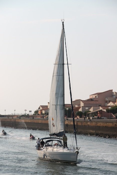 sailing Boat on water at coastline