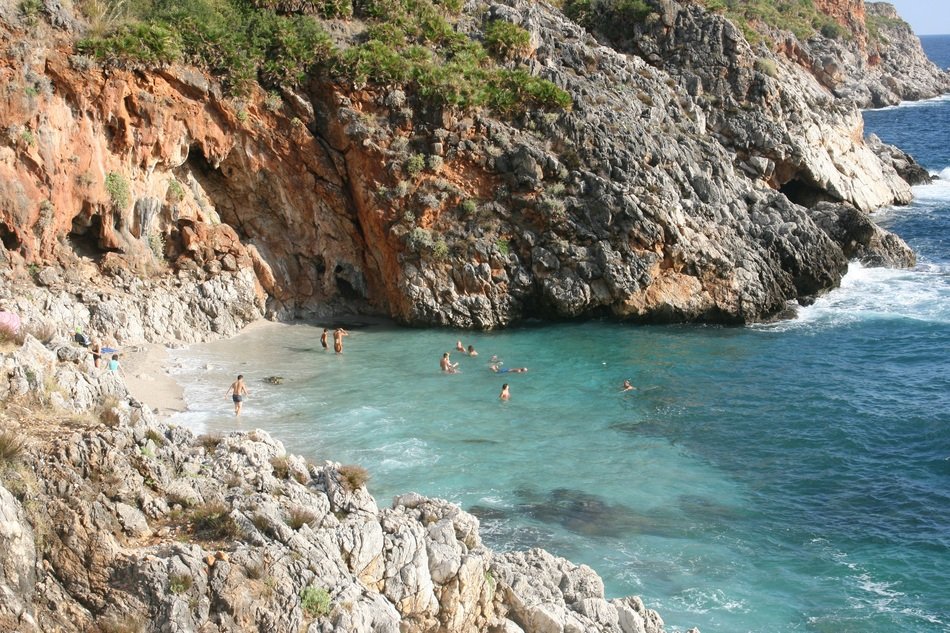 people on the beach in the reserve