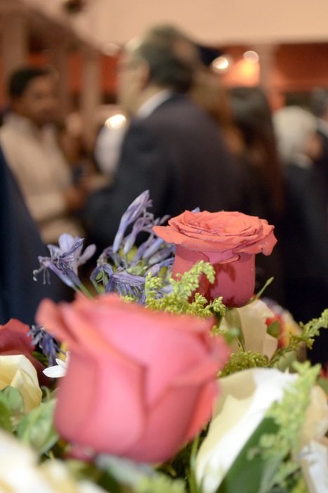 pink roses in a bouquet at corporate party