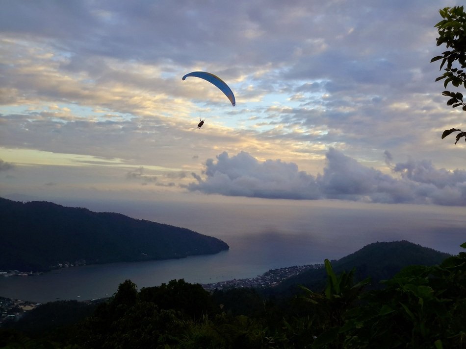 skydiver over the island landscape