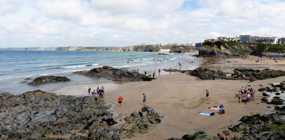 tourists on the beach on the Cornwall coast