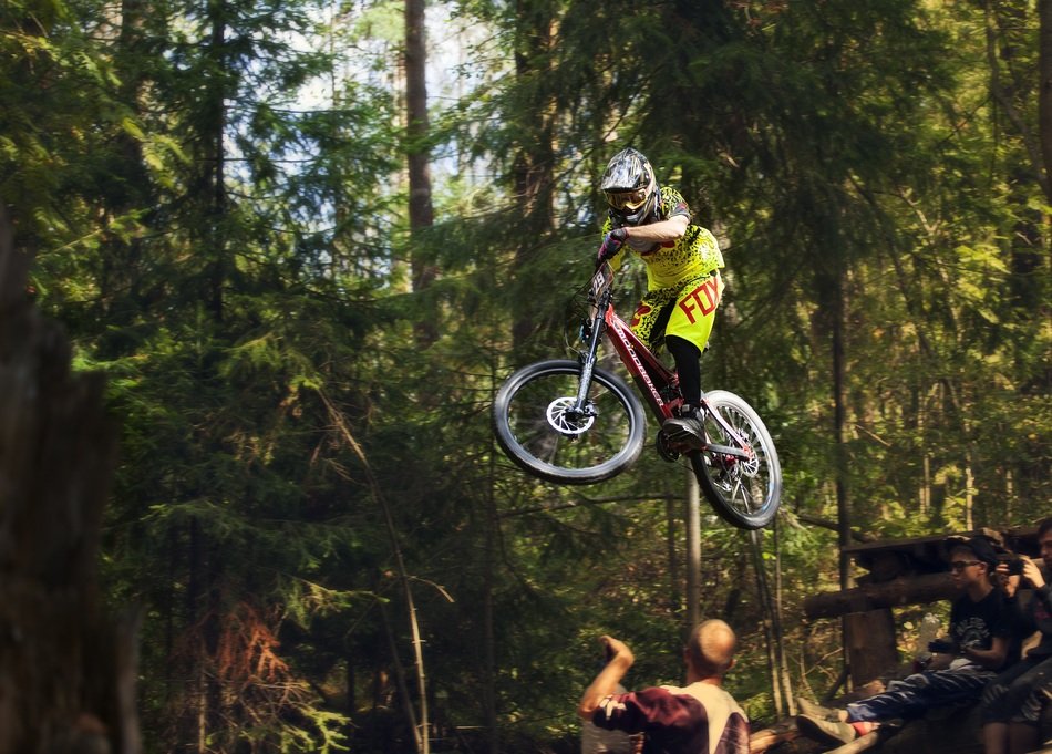extreme motorcycle jumps in the forest
