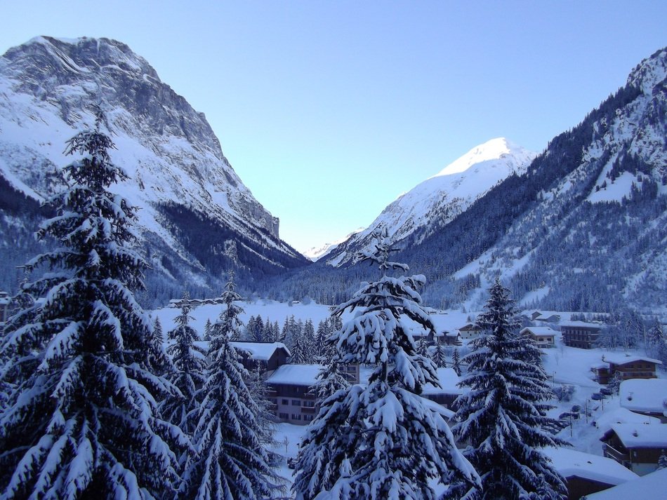 Alpine Village among Mountains at winter