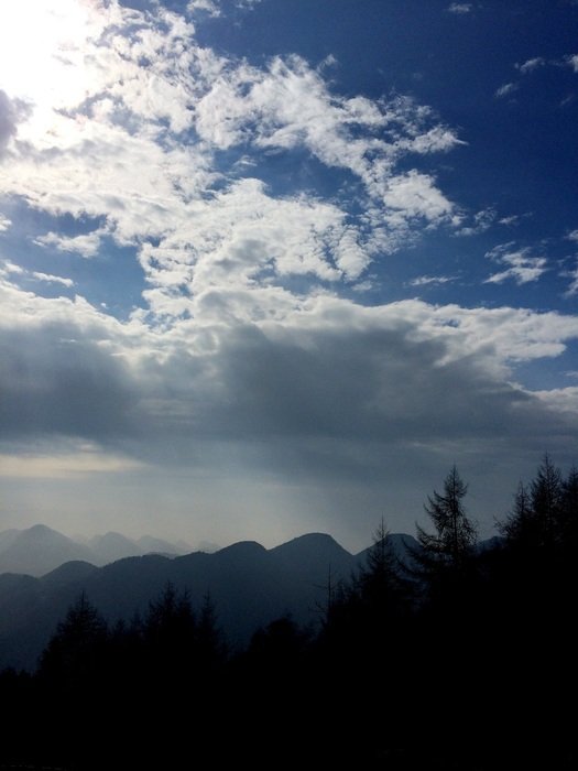 landscape of clouds over mountain