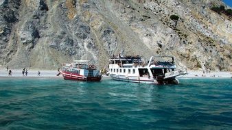 landscape of touristic boats on the lalaria beach