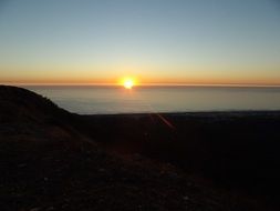 Sunset Landscape, golden sun at blue Water, Portugal