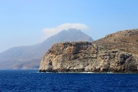 remote view of the rocky coast of greece on a sunny day