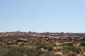 panoramic view of desert with cliffs in utah