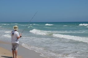 fishing on the beach by the sea