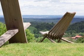 wooden chairs in a garden