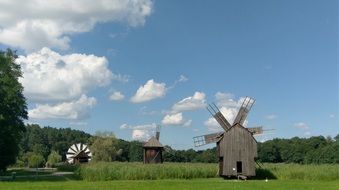 Wooden Windmill on a field