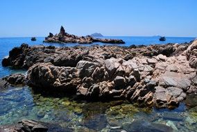 picturesque stone coast of the sea on a sunny day