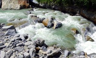 stone river flow in switzerland