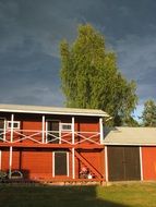 new red Finnish Granary at summer