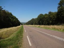 panorama of a road along rural fields
