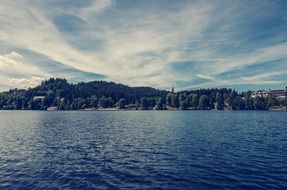 distant view of the mountain coast of the lake