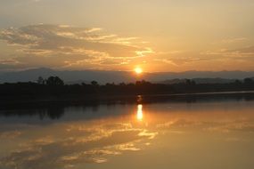 orange morning over the water