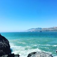 waves of turquoise water near the stones