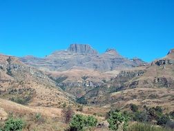 Beautiful landscape of the mountains with green plants at blue sky background in Drakensberg in the South Africa