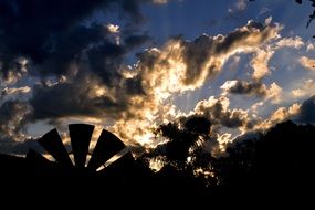 dark and golden dramatic clouds at evening sky