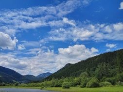 white clouds over a picturesque landscape