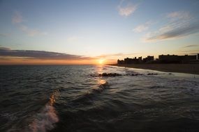 waves of the atlantic ocean at dusk