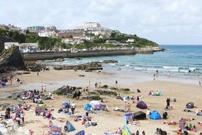 people on the beach in newquay