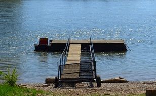 landscape of wooden pier at the pond
