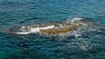 Reef in Sea, Waves spashing on Rock