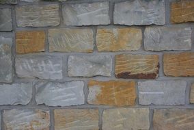 yellow-gray stone wall