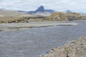 distant view from a river to glaciers in iceland