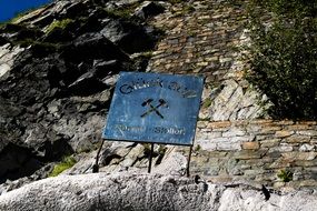 old mine sign on the mountain