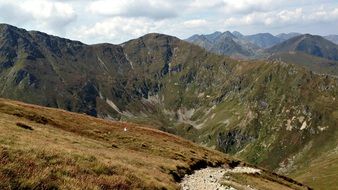 peaks of the western Tatras under a cloudy sky