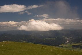 panoramic view of white clouds over mountains in austria