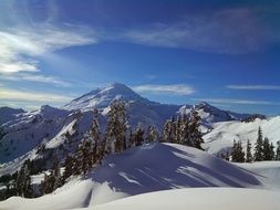 bright sun over snow-covered mount shuksan